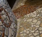 Palladian in travertine star in a restaurant in Rome.
